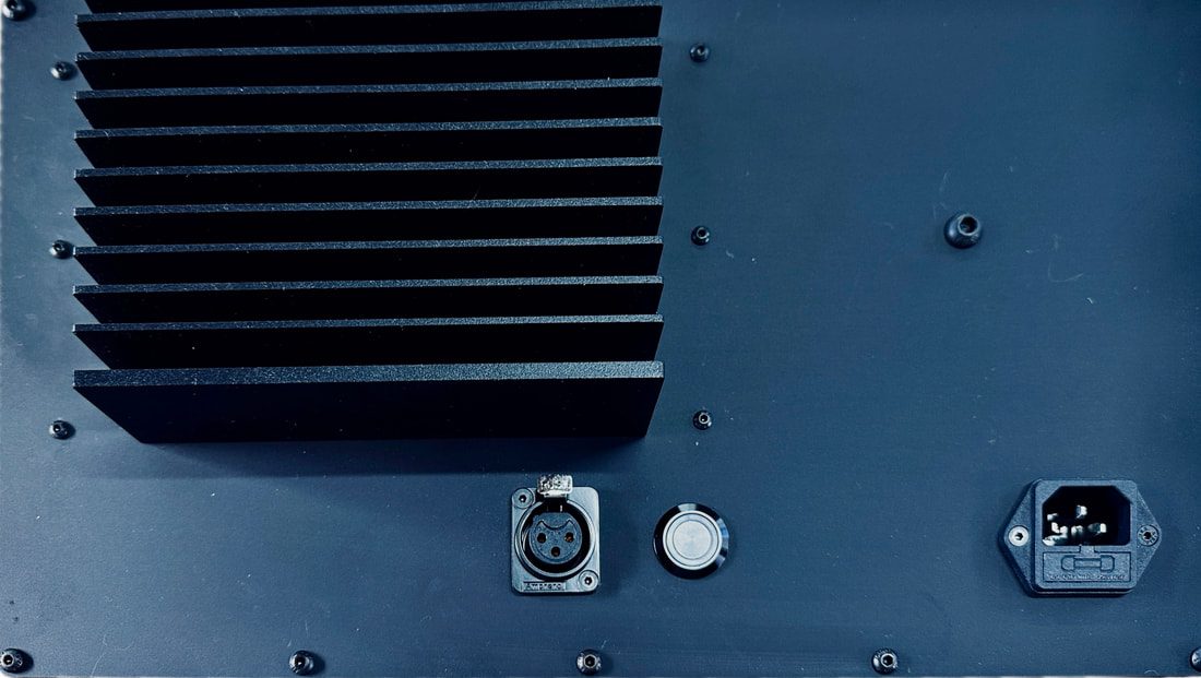 Rear panel of the MAD PRO ONE showing heat sink, XLR input and power connection